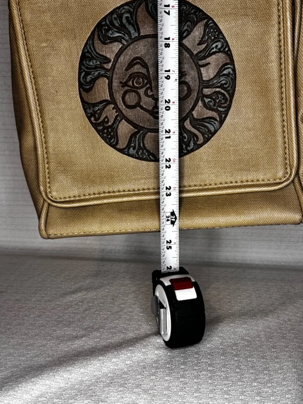 Metallic Gold Crossbody Bag with Sun Medallion